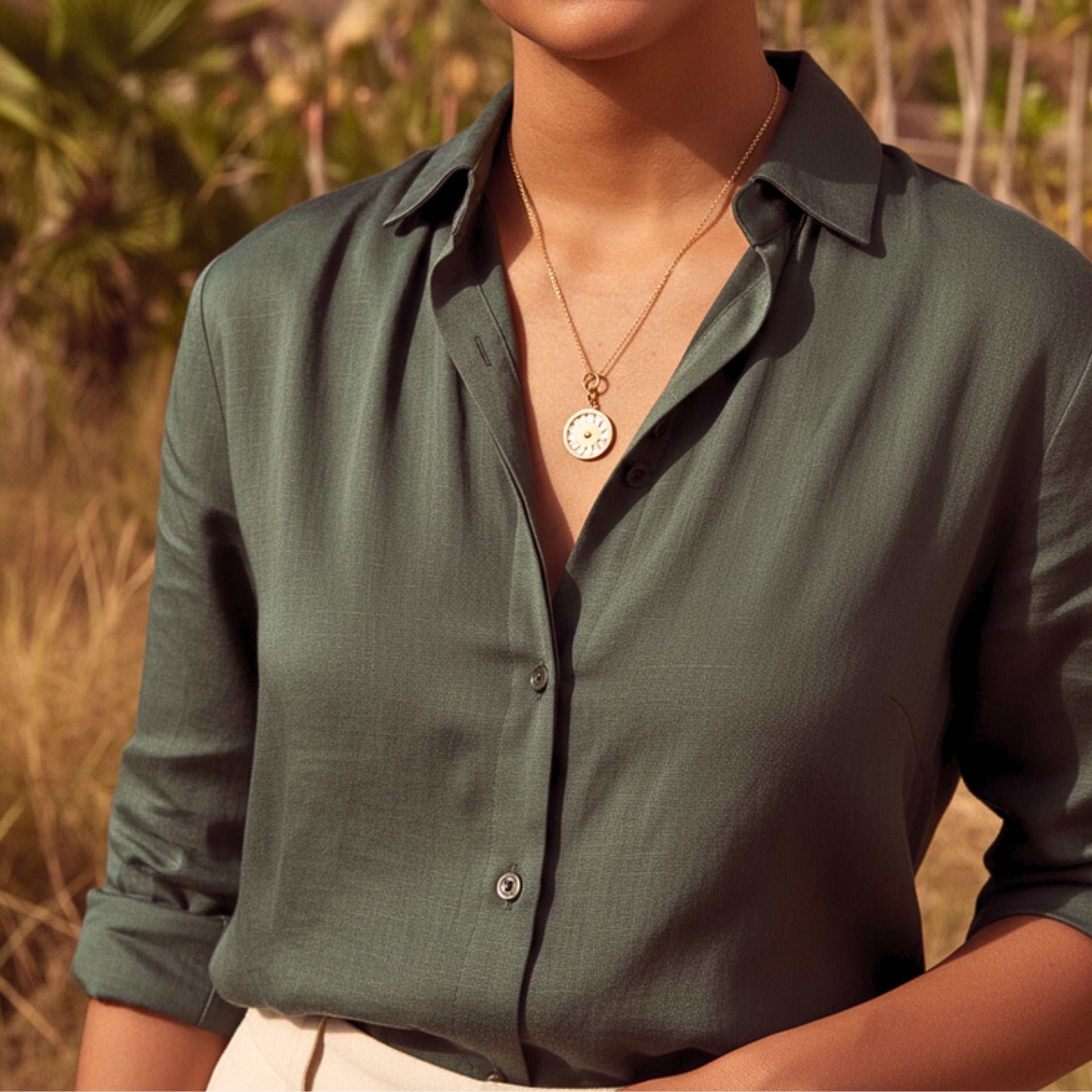 Women's Sunburst Pendant Necklace - Gold PVD Stainless Steel