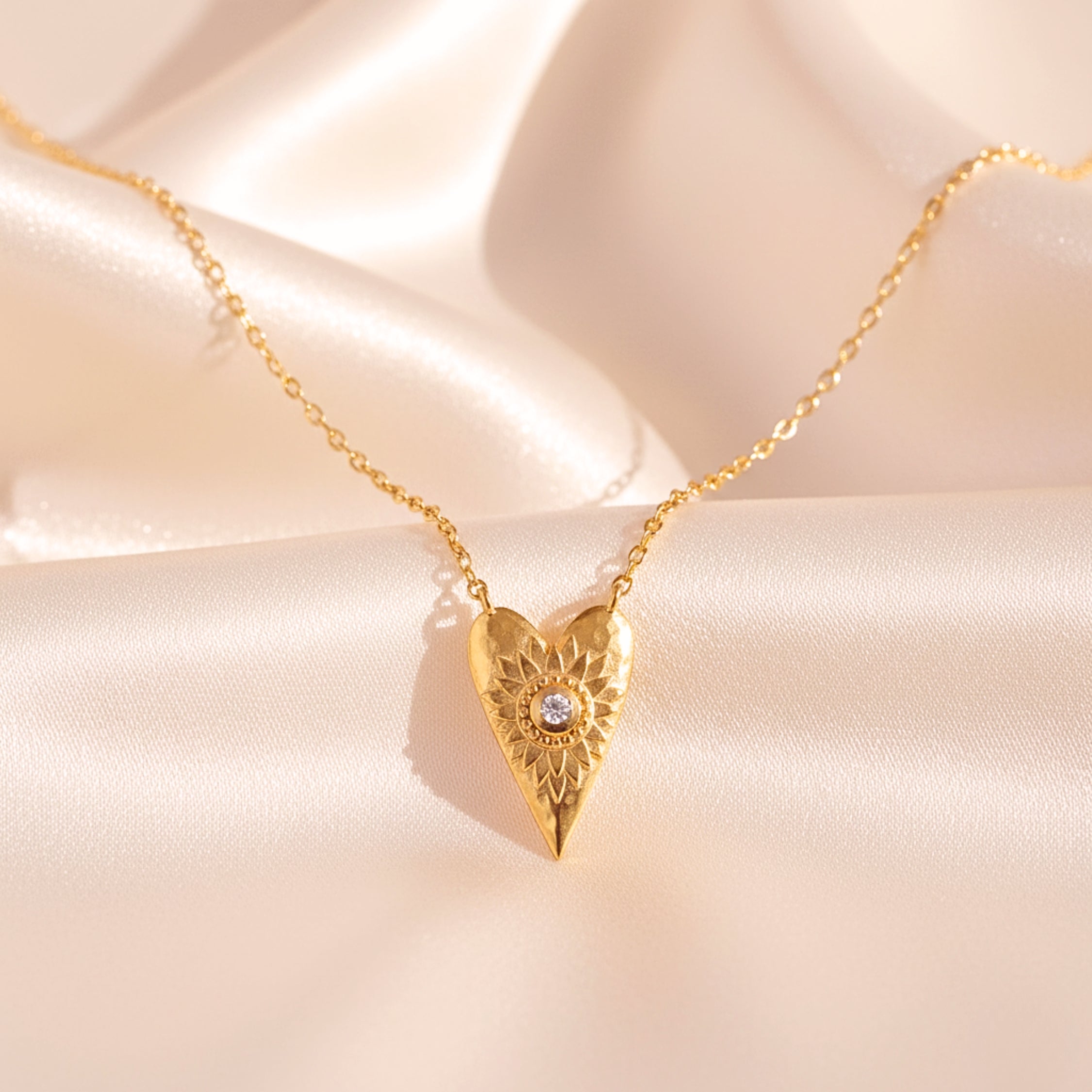 Women's Sunburst Heart Pendant Necklace - Gold PVD Stainless Steel