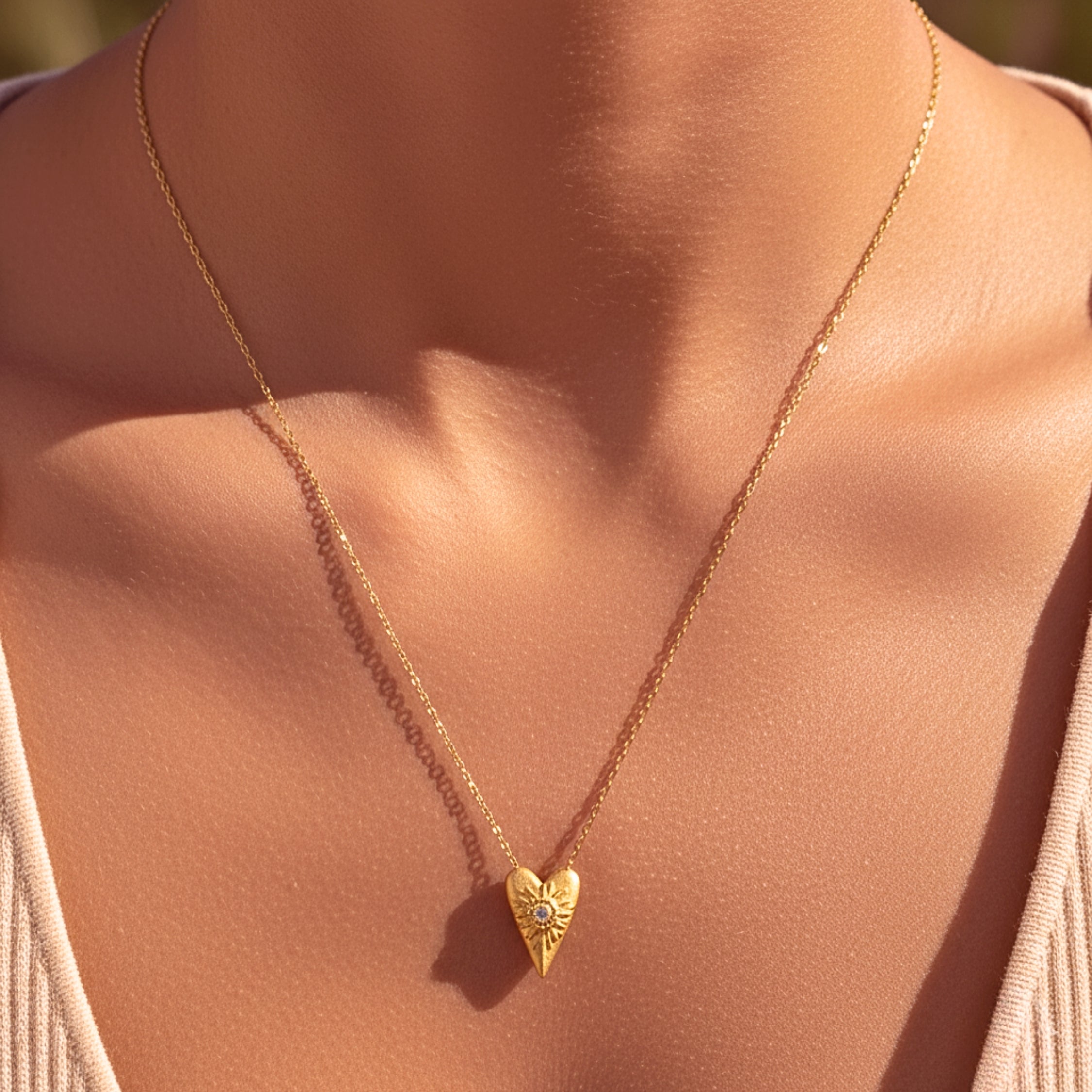 Women's Sunburst Heart Pendant Necklace - Gold PVD Stainless Steel