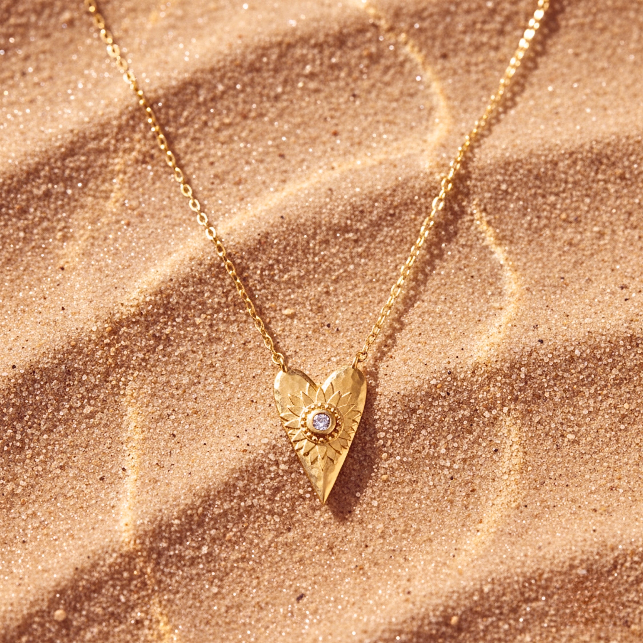 Women's Sunburst Heart Pendant Necklace - Gold PVD Stainless Steel